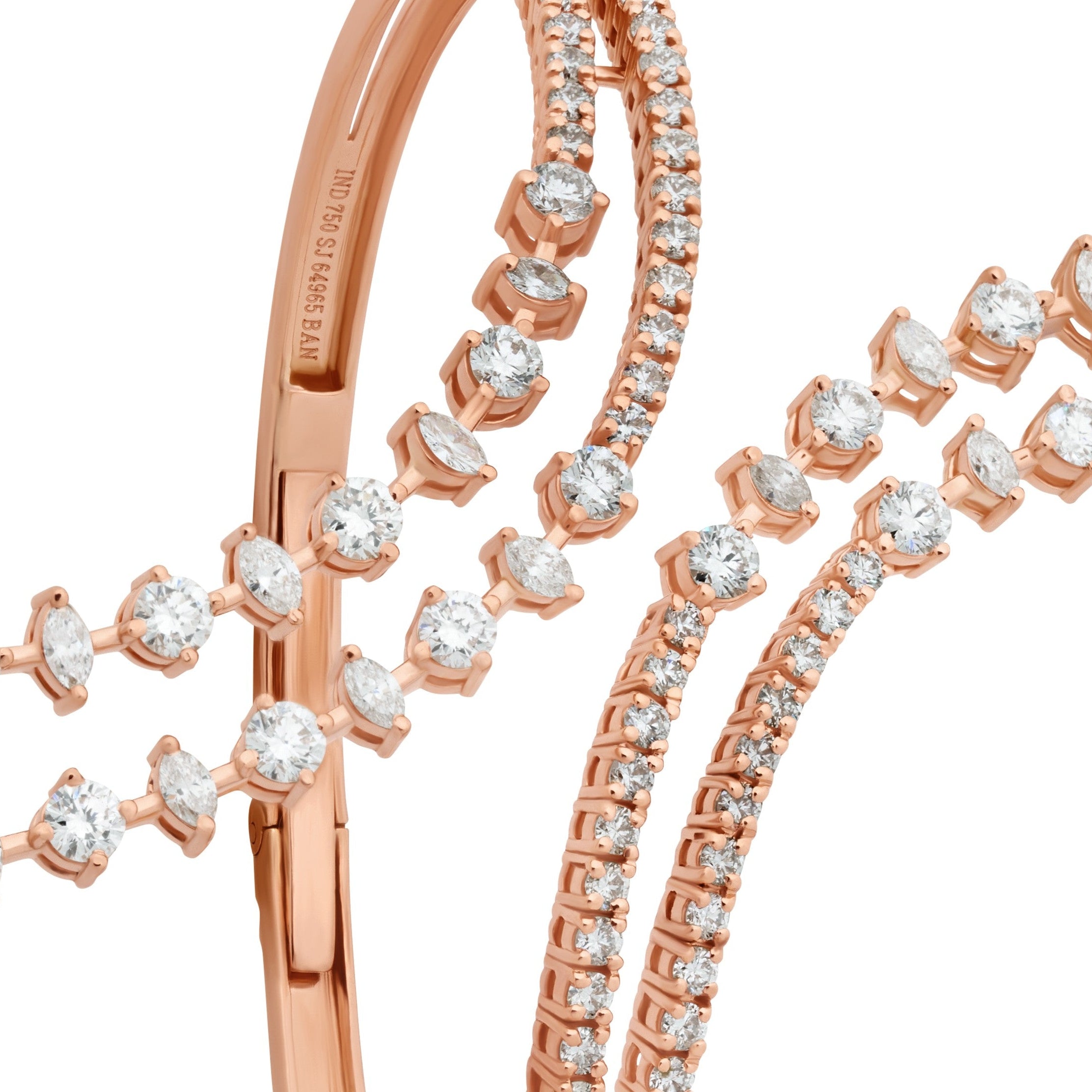 Rose gold bracelet with diamond accents on a white background