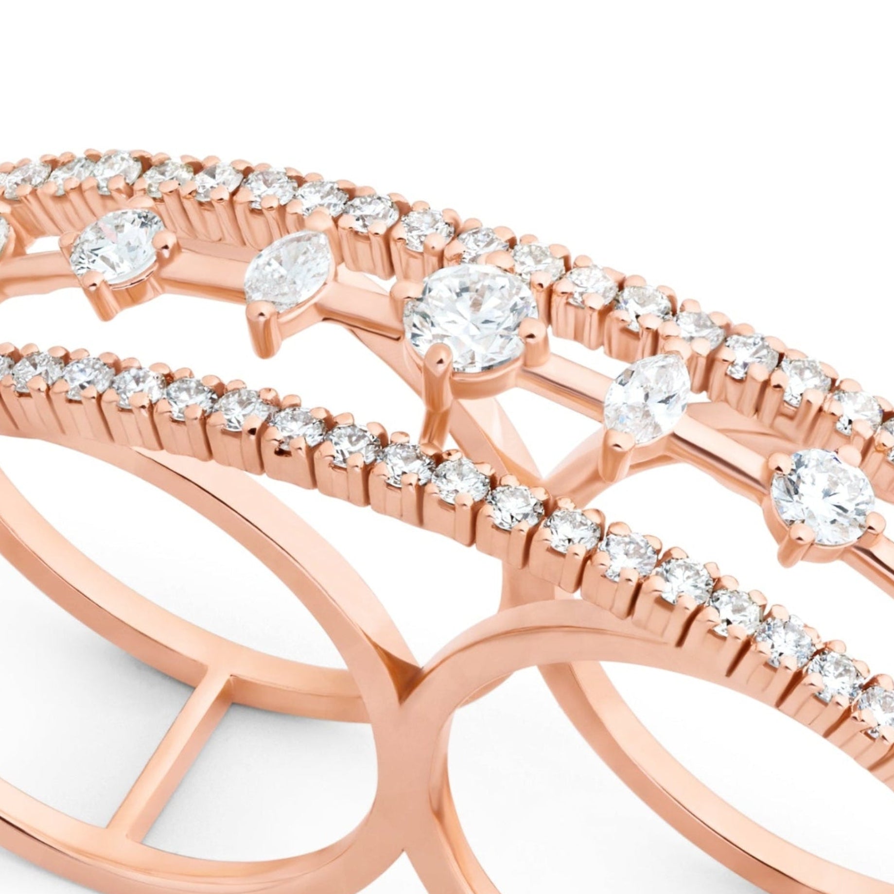 Rose gold ring with diamond accents on a white background