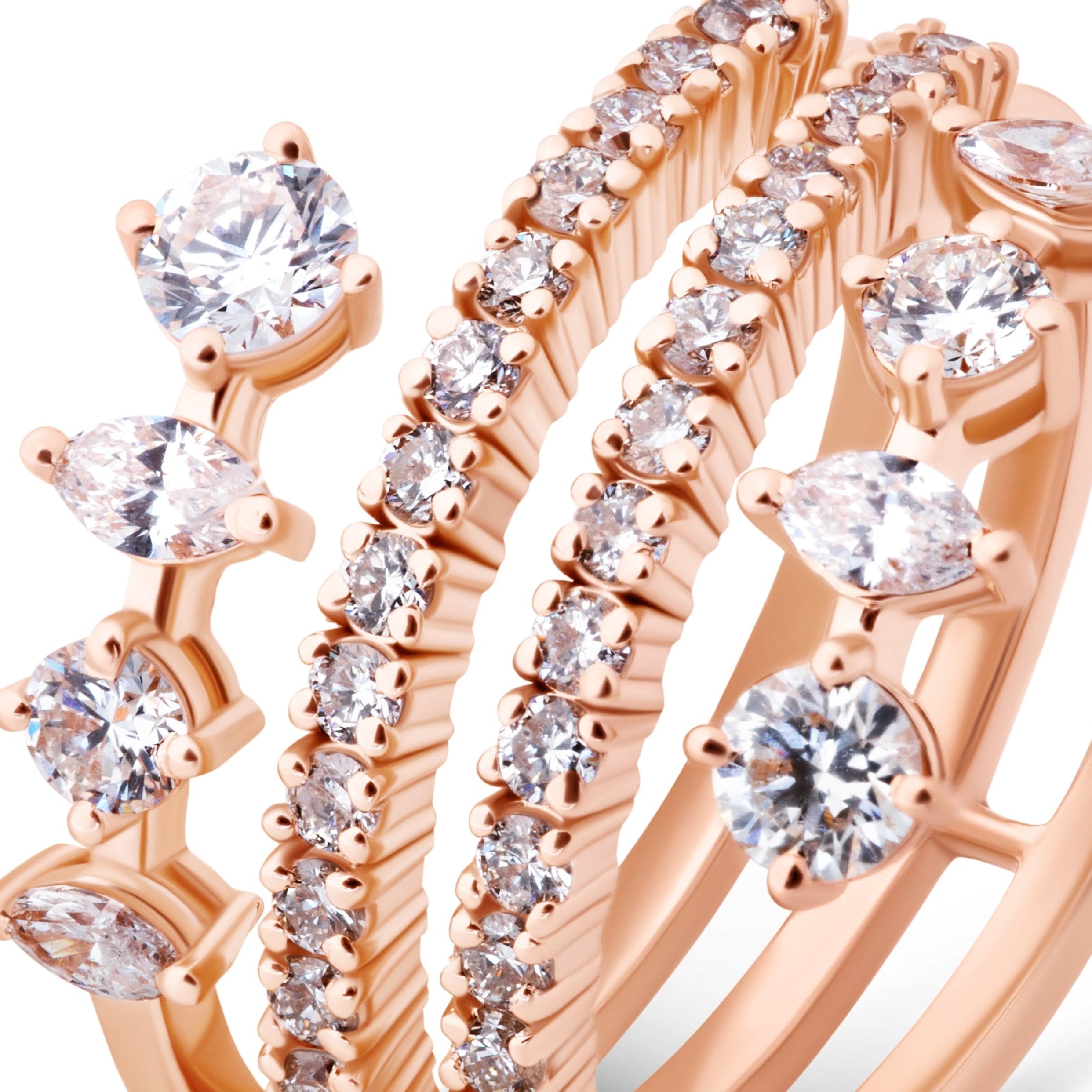 Rose gold ring with diamond accents on a white background