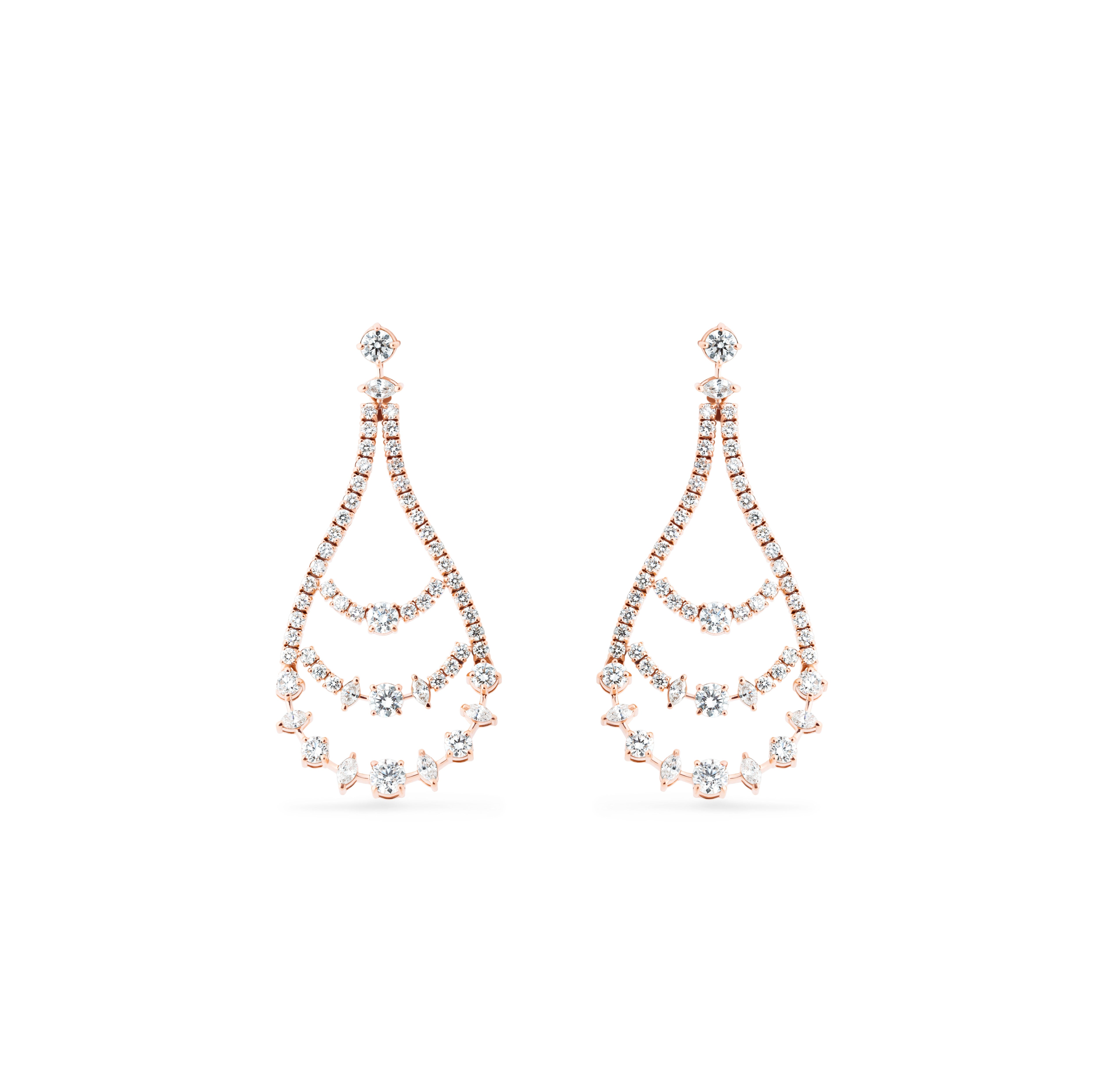 Rose gold and diamond teardrop earrings on a white background