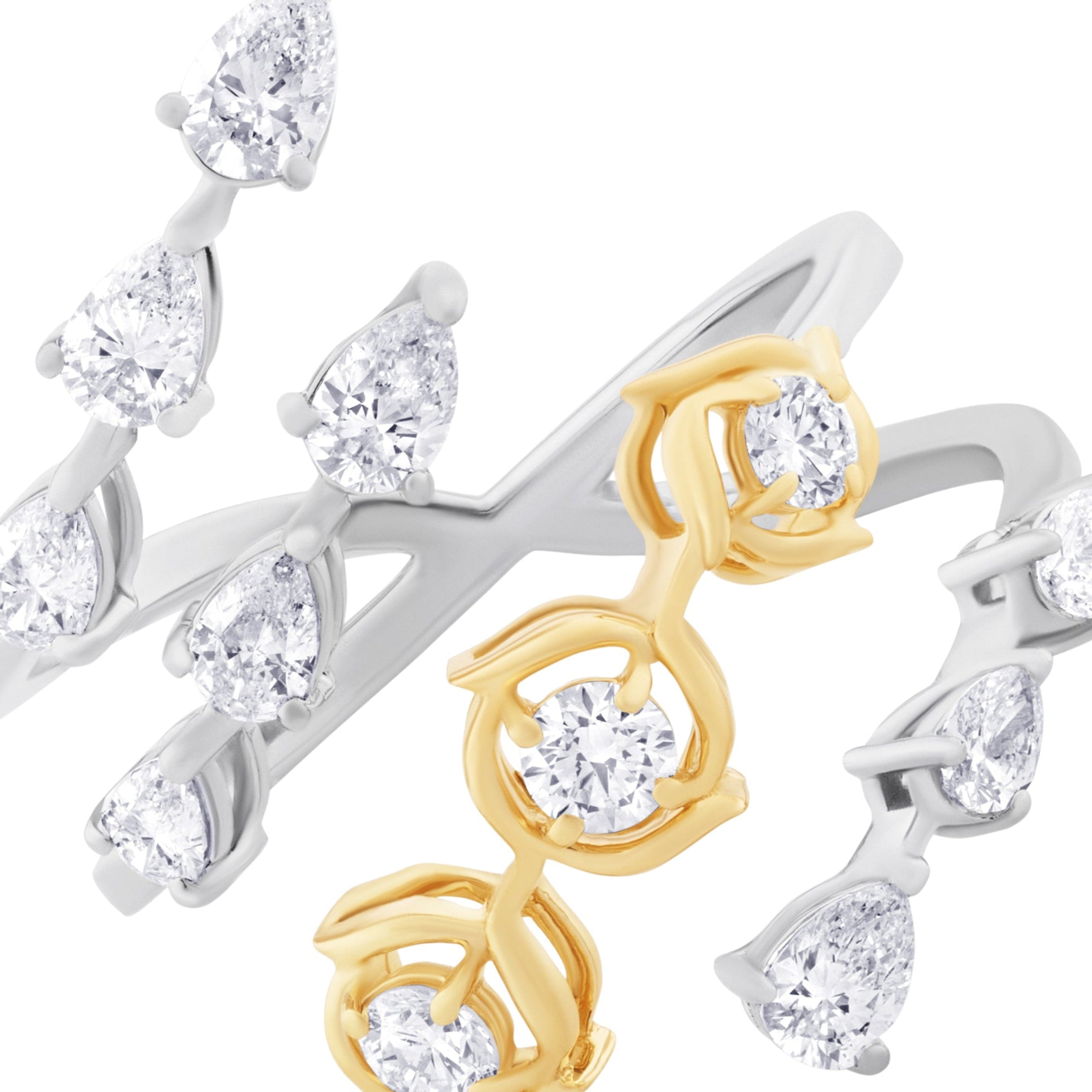 Pair of earrings with gold and silver designs on a white background