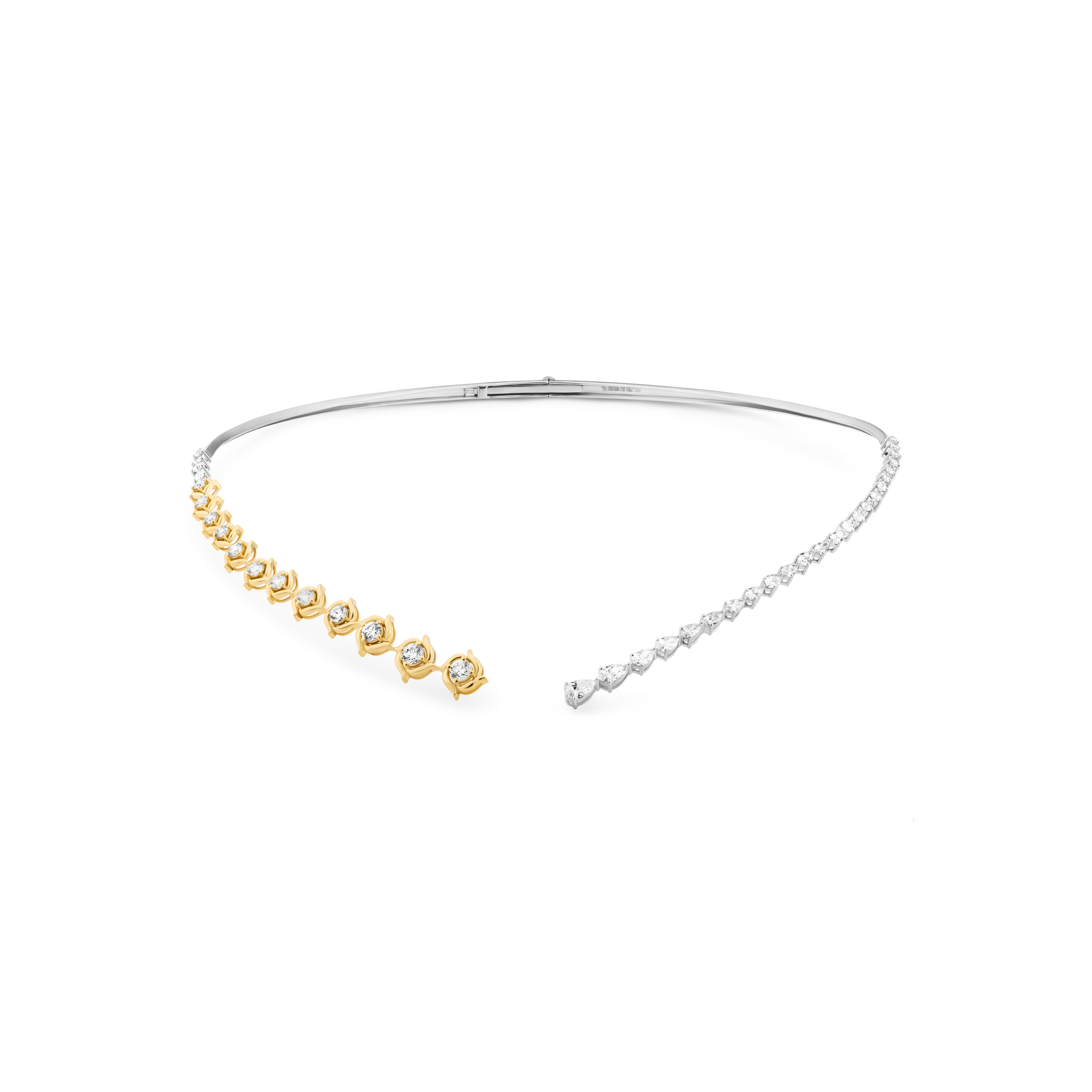 Gold and silver choker necklace on a white background