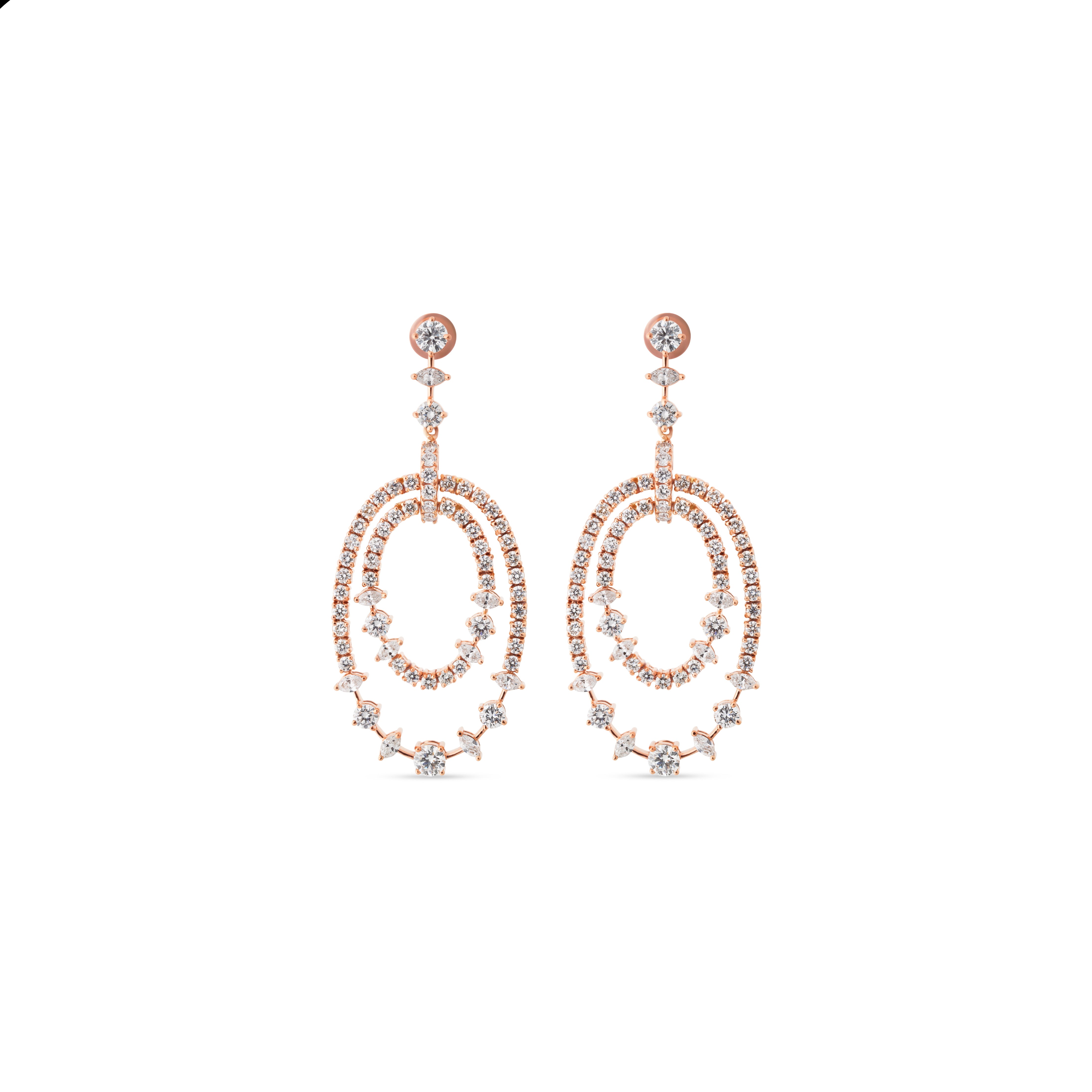Rose gold and diamond earrings on a white background