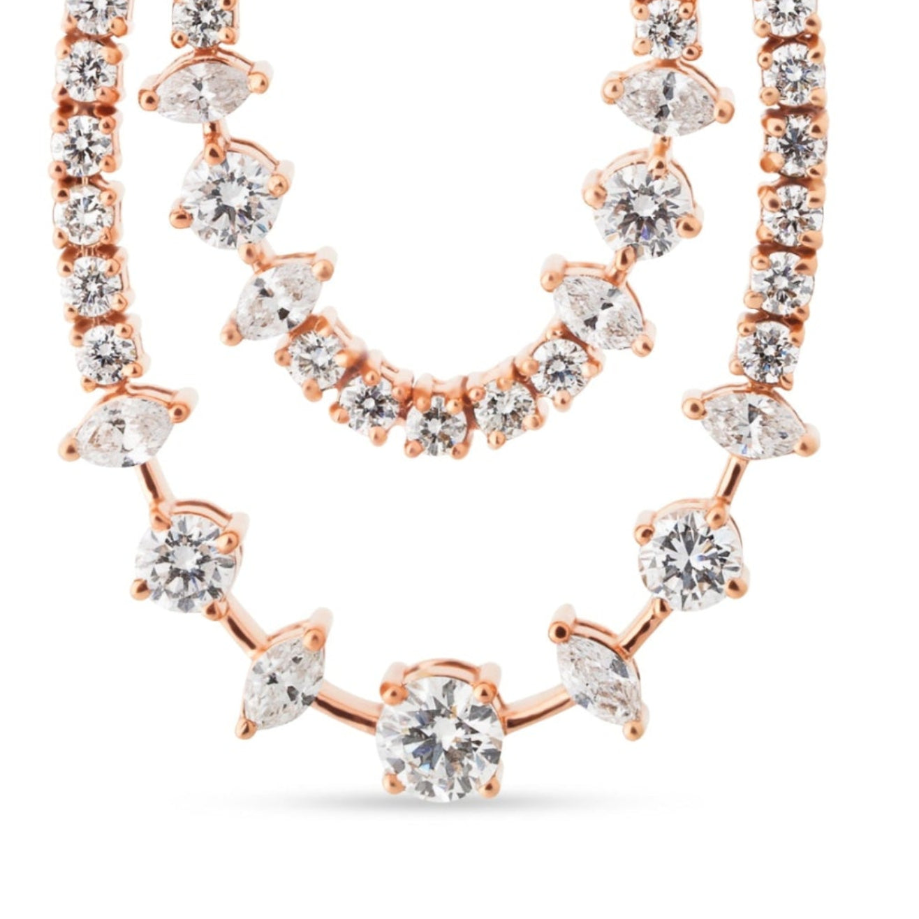 Rose gold and diamond earrings on a white background