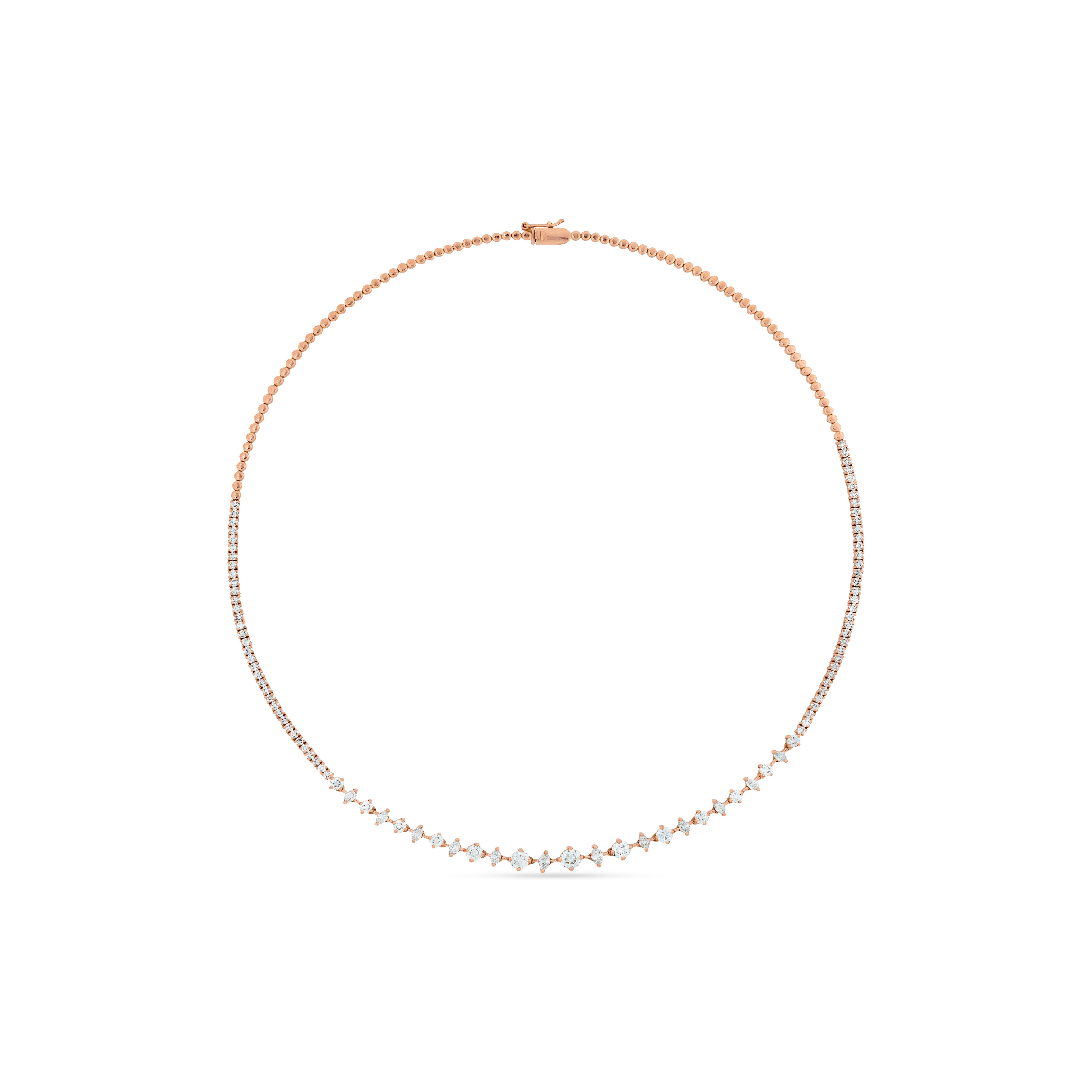 Rose gold necklace with small pearls on a white background