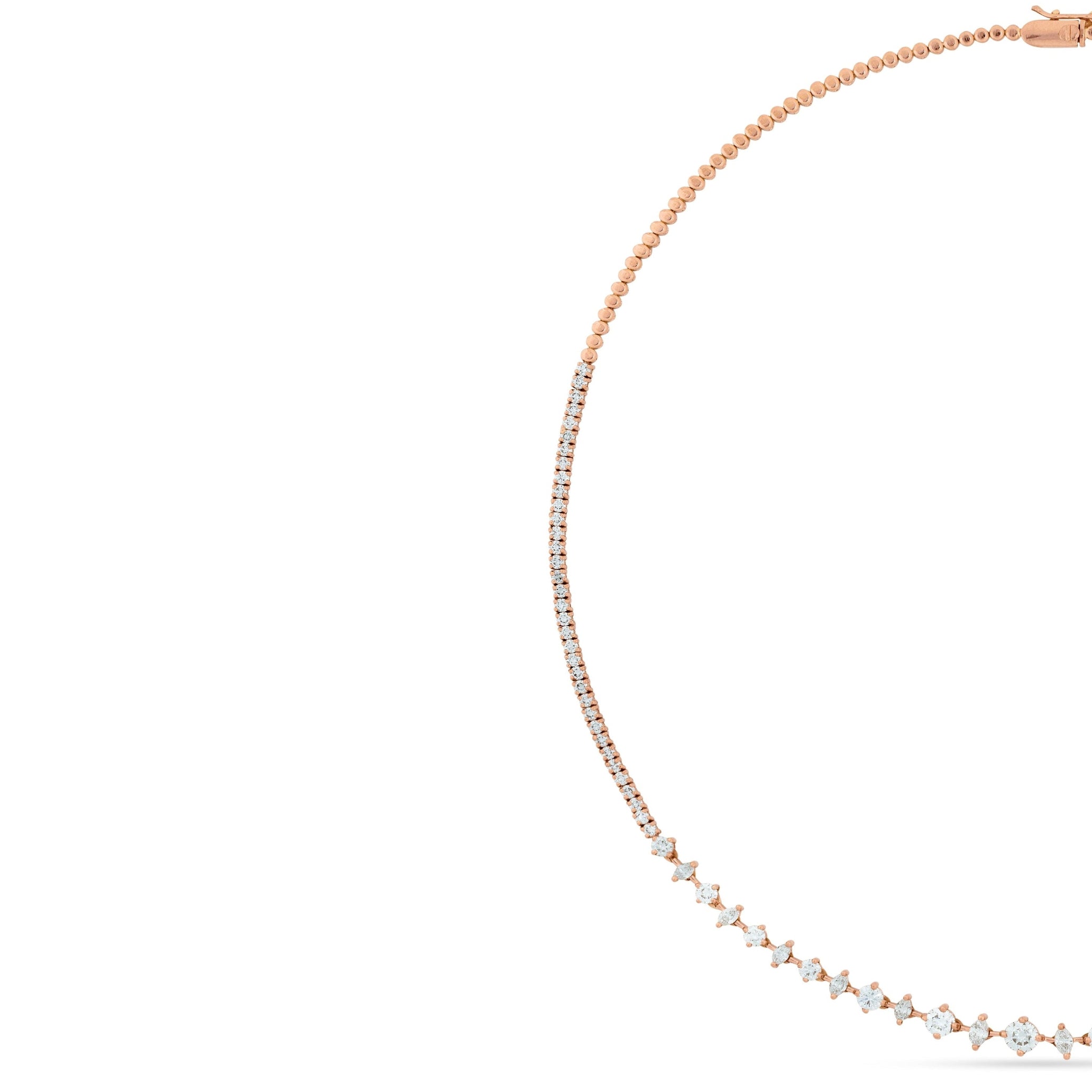 Rose gold necklace with small pearls on a white background