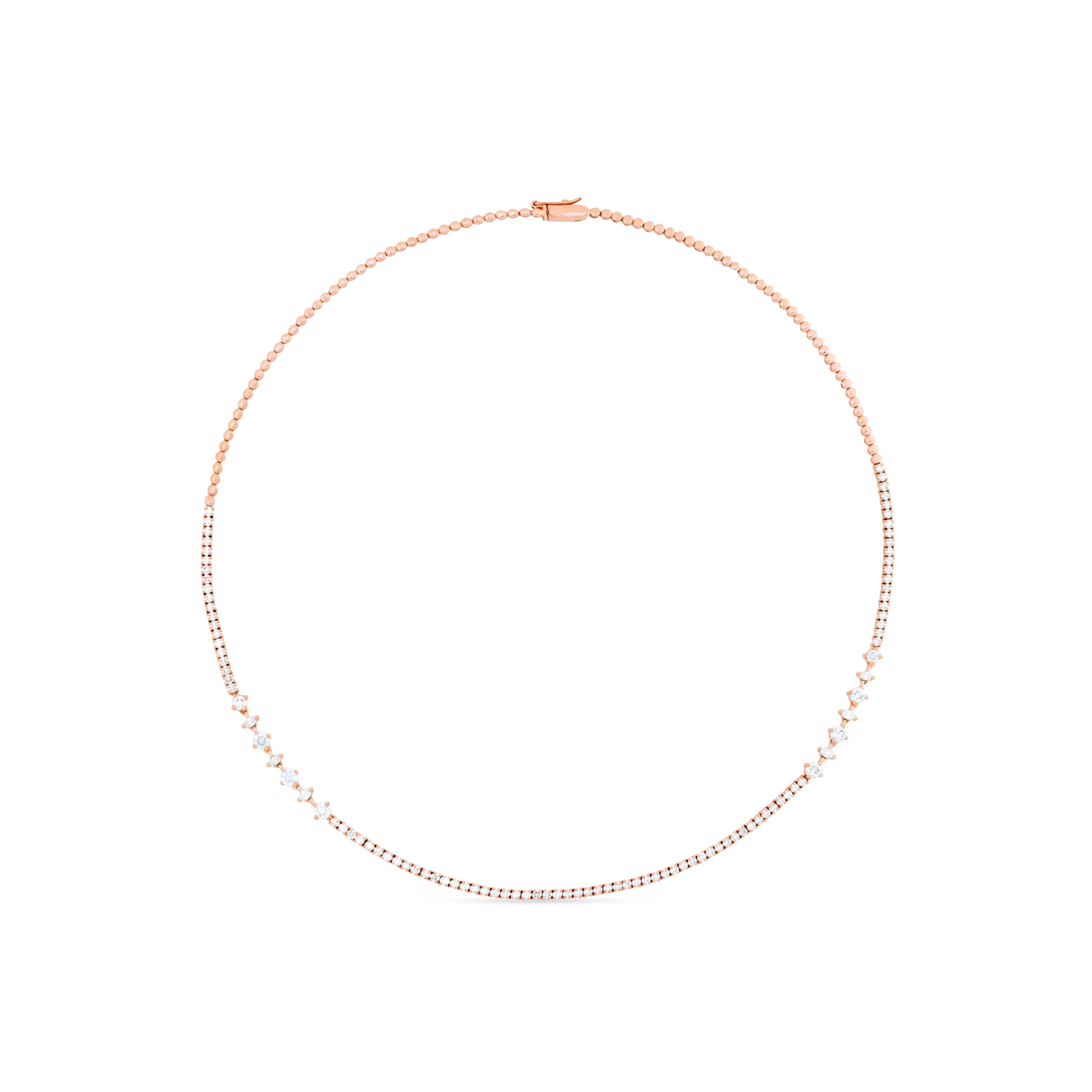 Rose gold necklace on a white background