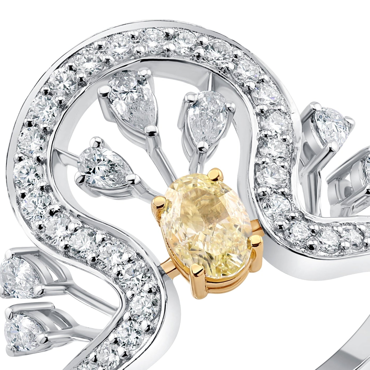 GOLD ring with a yellow gemstone on a white background
