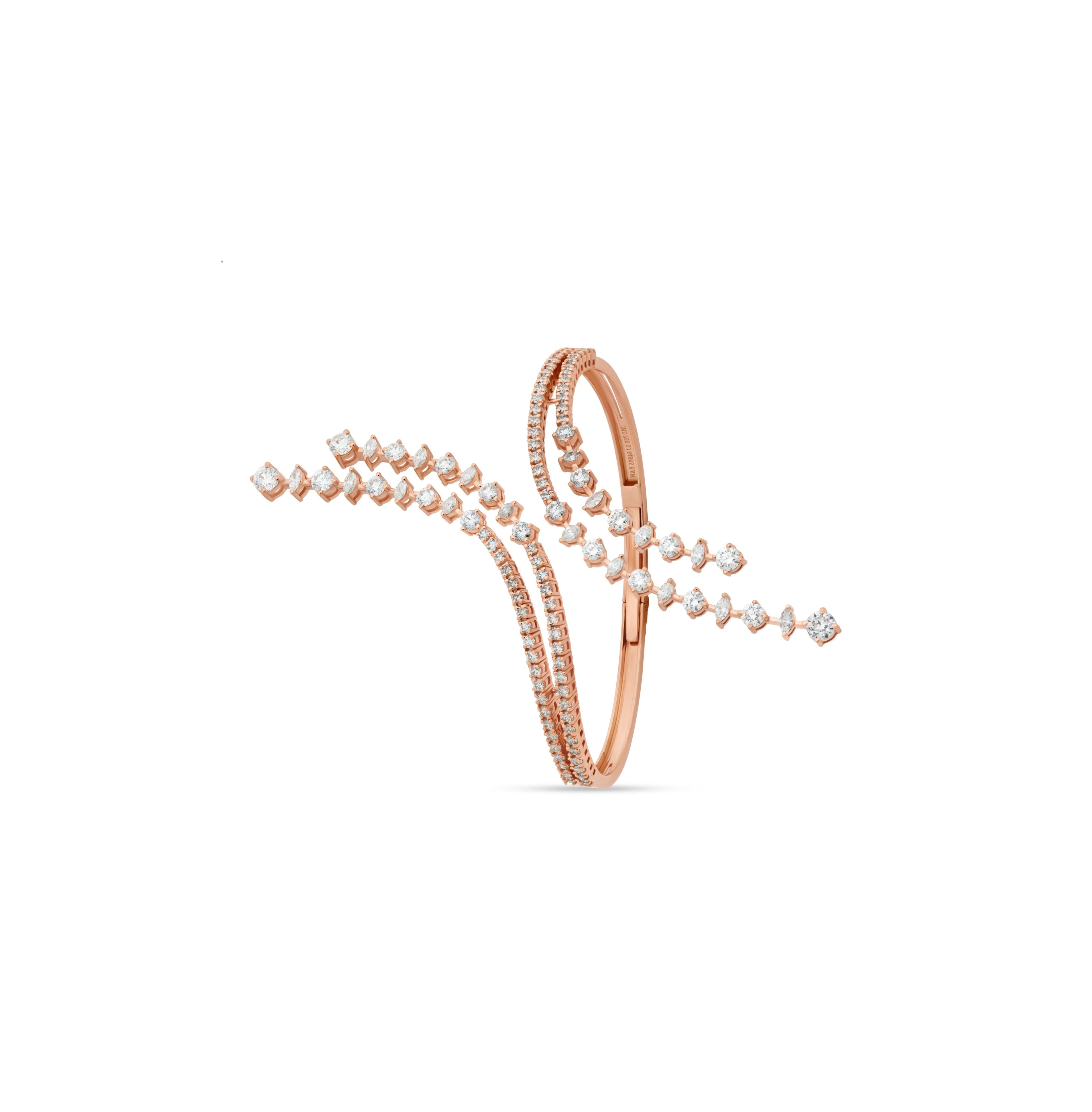 Rose gold bracelet with diamond accents on a white background