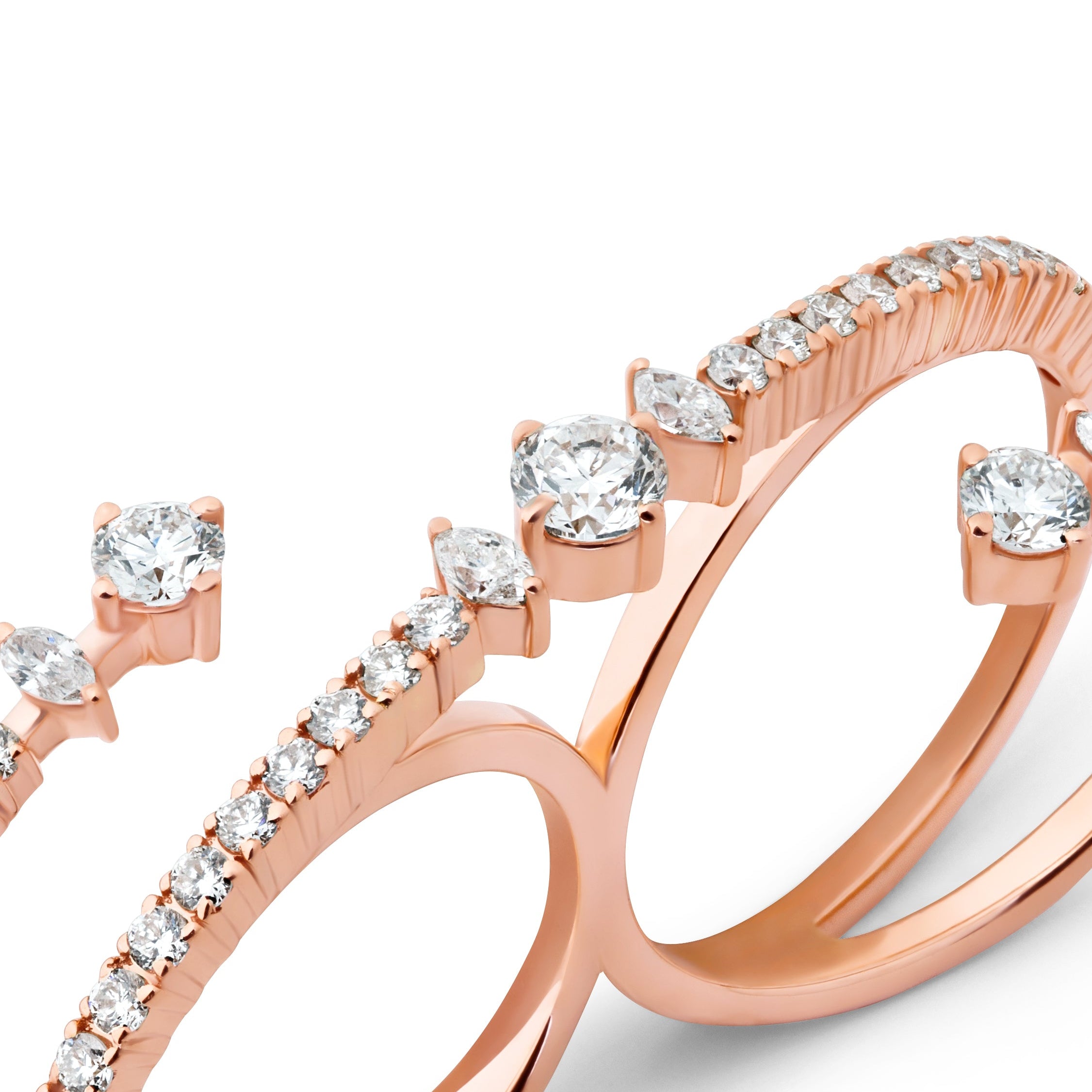 Rose gold rings with diamond accents on a white background
