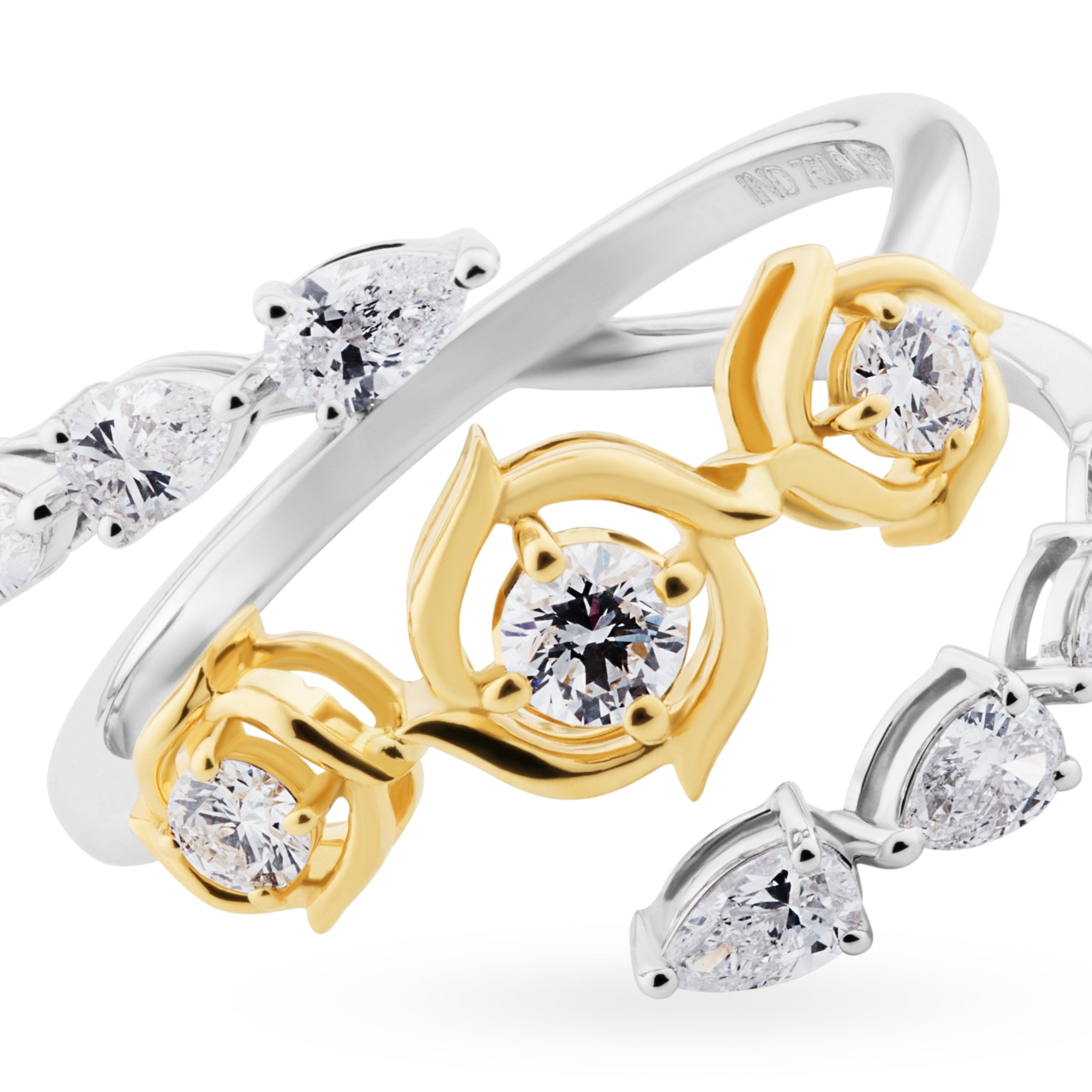 Two gold and silver rings with diamond accents on a white background
