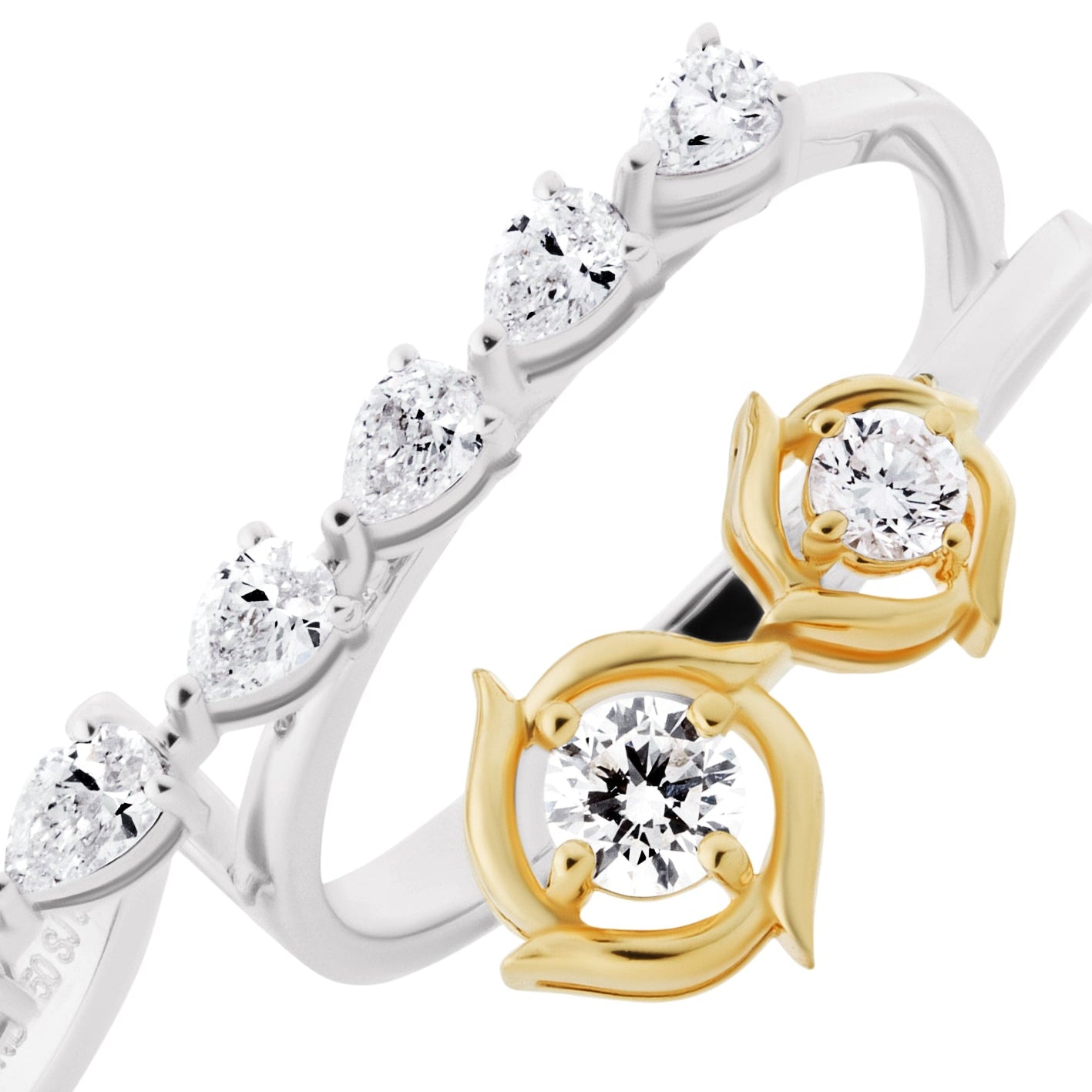 Two gold and silver rings with diamond accents on a white background