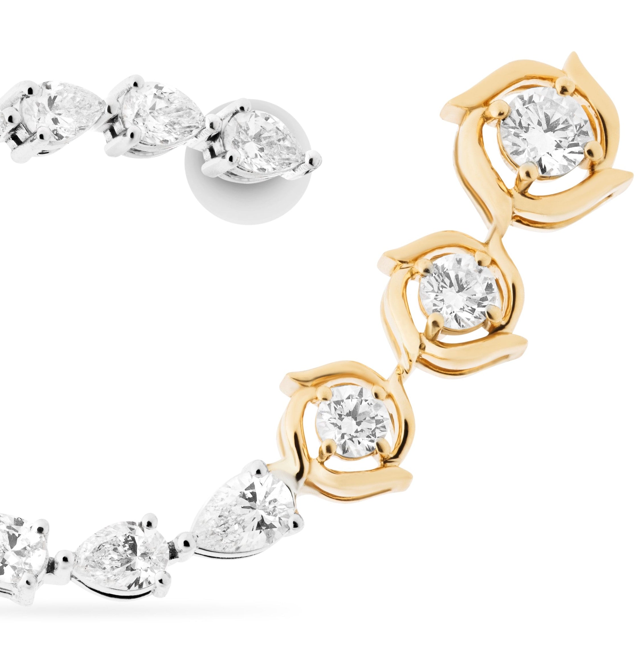 Pair of gold and silver hoop earrings on a white background