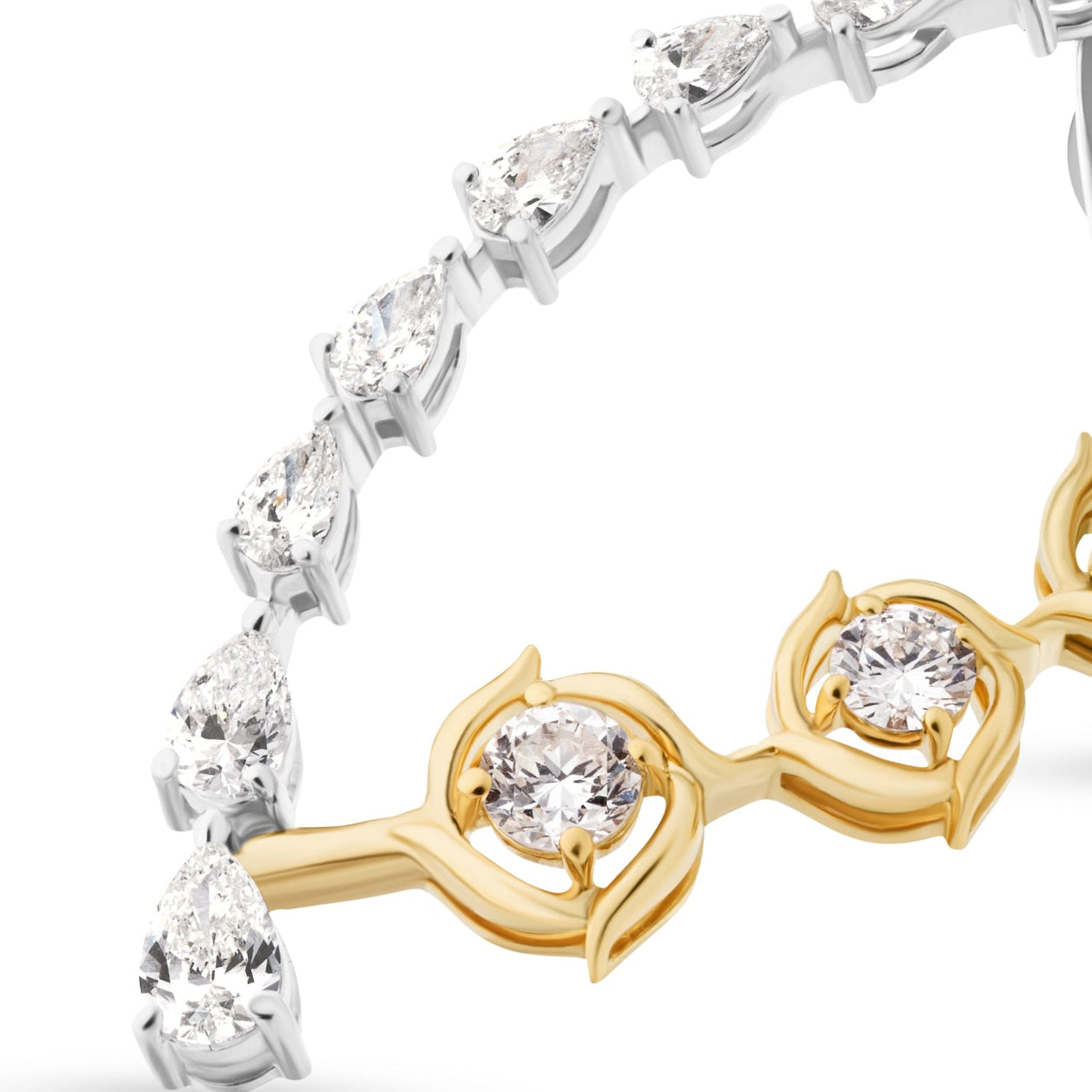 Pair of gold and silver hoop earrings on a white background