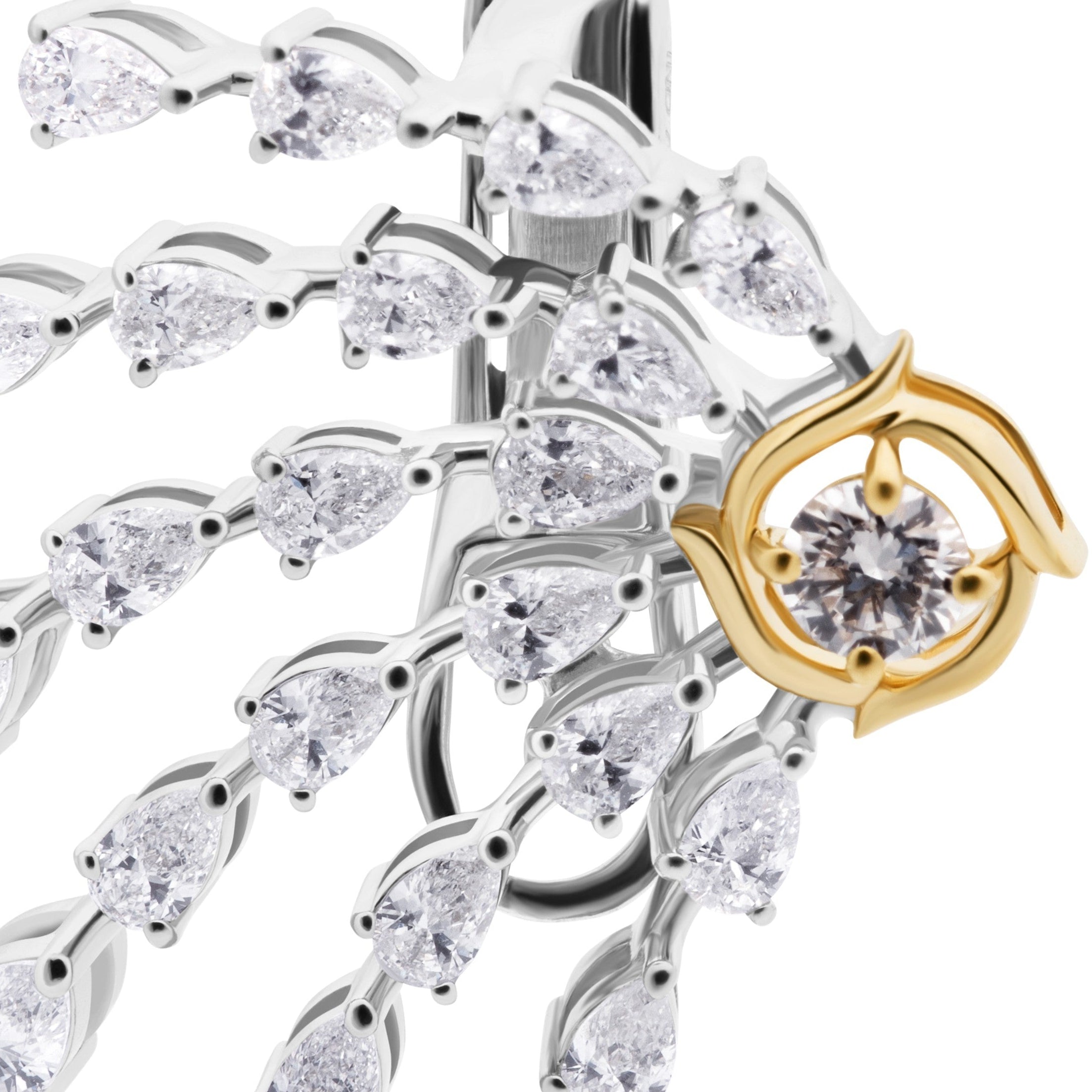 Jewelry piece with clear gemstones and gold accents on a white background