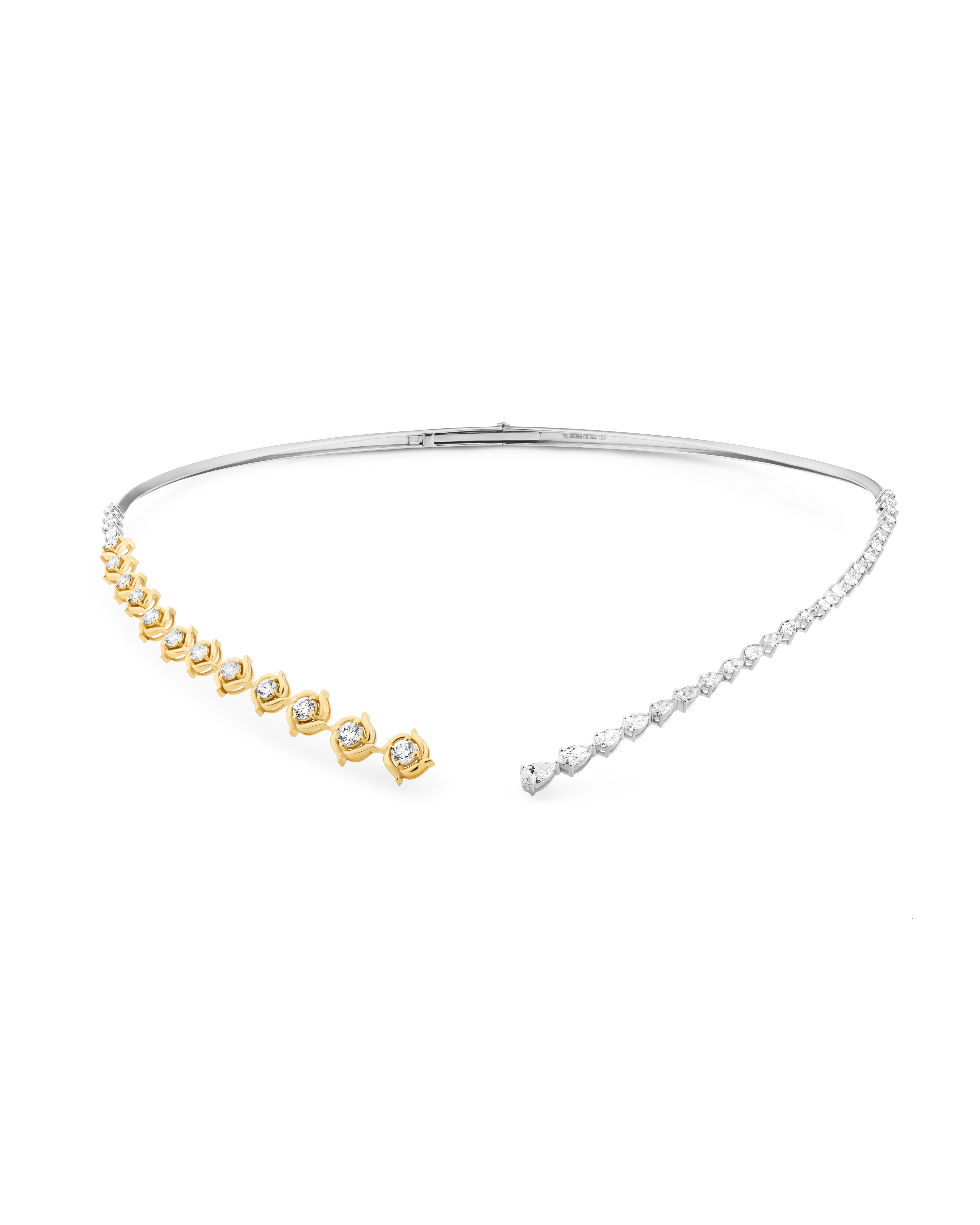 Gold and silver choker necklace on a white background