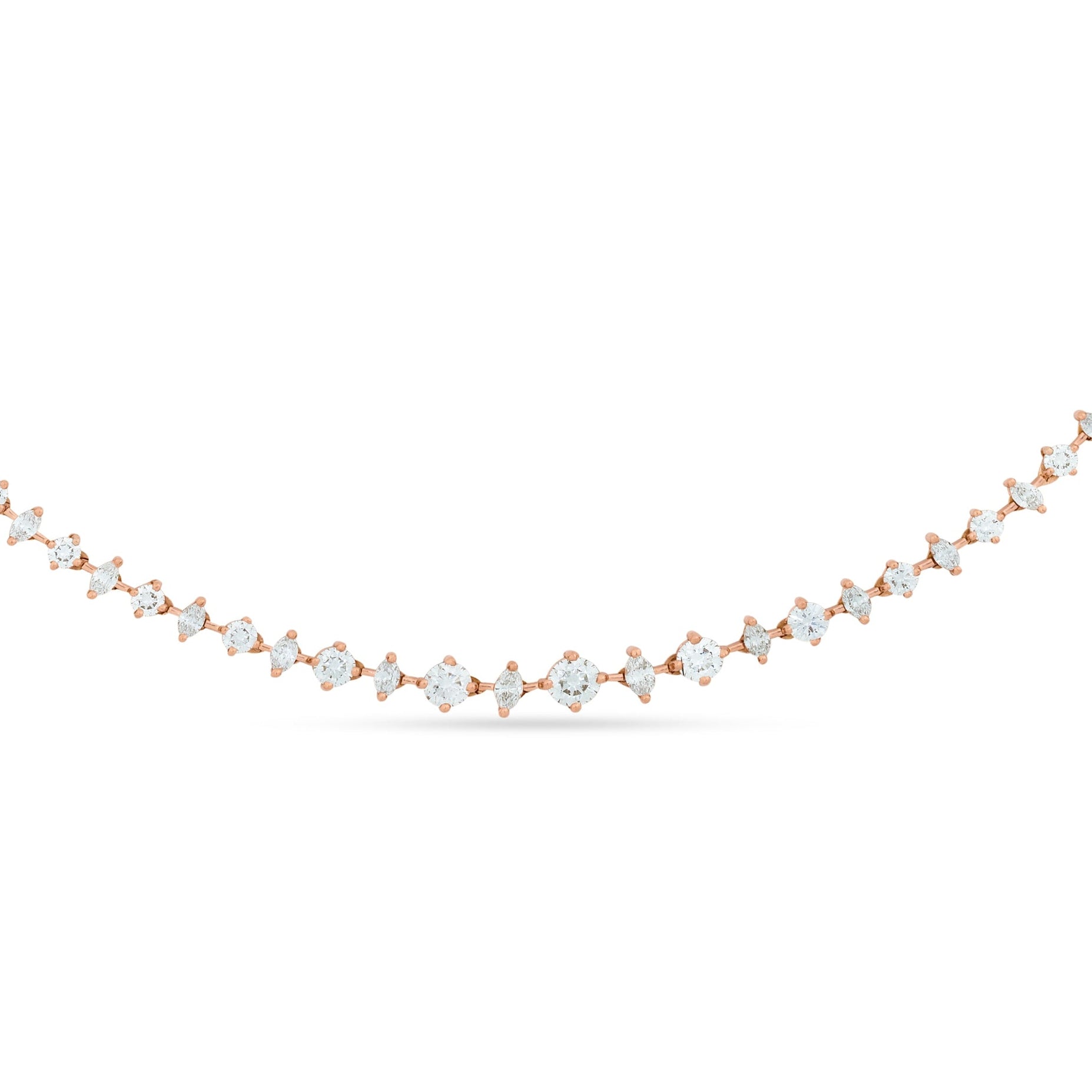 Rose gold necklace with small pearls on a white background