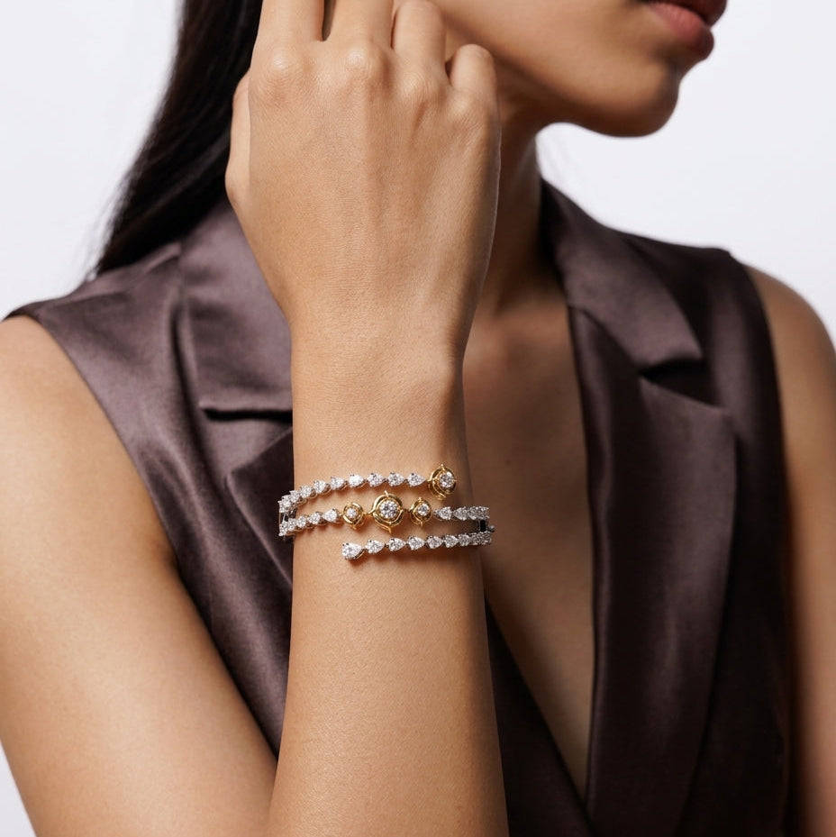 Woman wearing a bracelet with a neutral background