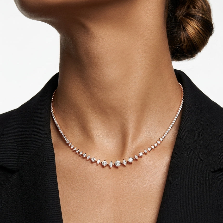 Necklace worn by a person against a neutral background